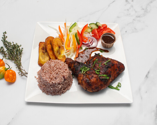 Jerk chicken with rice and peas